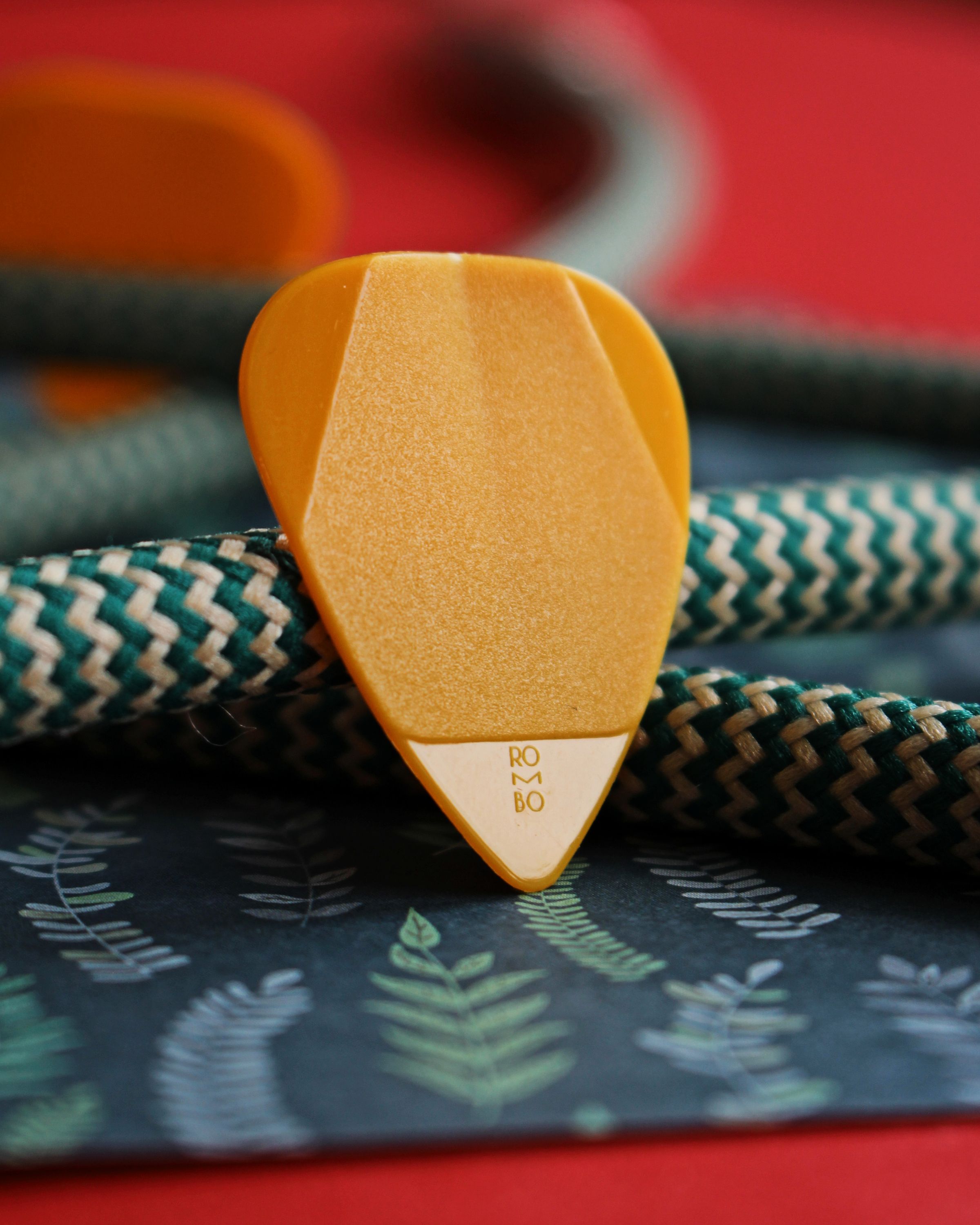 Close-Up Photo of Yellow Guitar Pick · Free Stock Photo