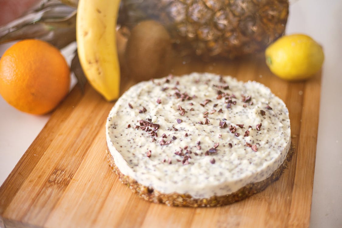 Free Cheesecake on a Wooden Board Stock Photo