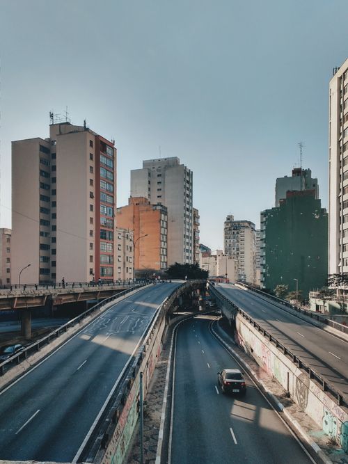 Free Aerial view of São Paulo expressway with surrounding buildings, capturing urban life. Stock Photo