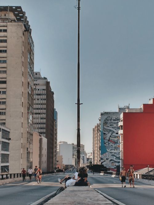 Free Dynamic street scene with people walking among high-rise buildings in São Paulo, Brazil. Stock Photo