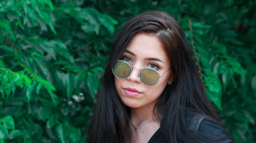 Photo of Woman Wearing Sunglasses