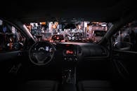 Black Car Steering Wheel during Night Time