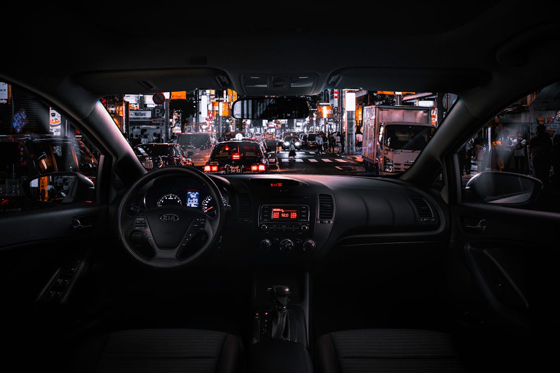 Black Car Steering Wheel during Night Time