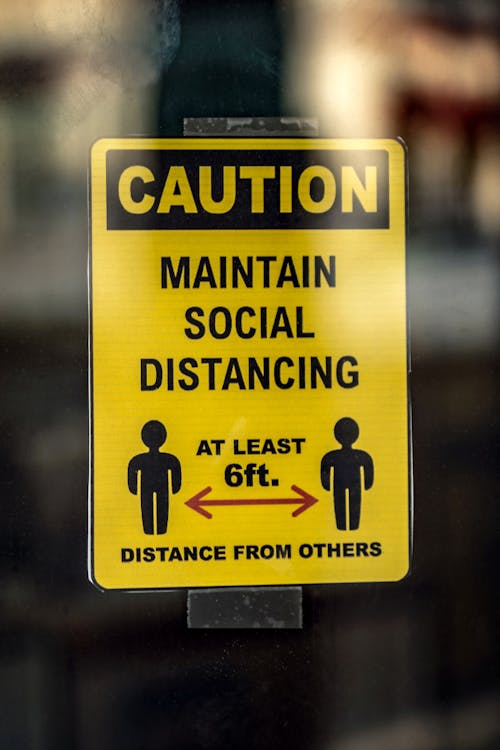 Yellow and Black Caution Wet Floor Sign