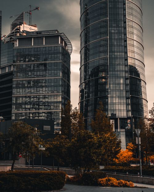Free Stunning view of contemporary glass skyscrapers in Warsaw's bustling business district. Stock Photo