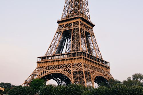 Free The Eiffel Tower's iconic structure in Paris captured on a clear day, showcasing its impressive iron lattice design. Stock Photo