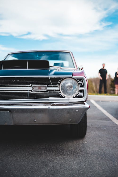 Free Photo of Classic Car Parked on Parking Lot Stock Photo