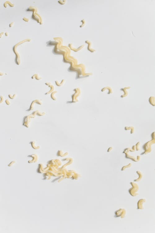 Photo of Uncooked Noodles on White Background