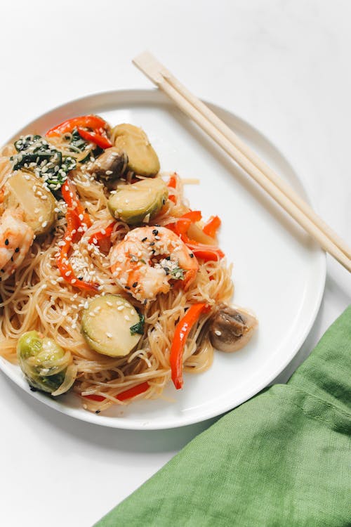 Noodle Dish With Shrimp on White Ceramic Plate