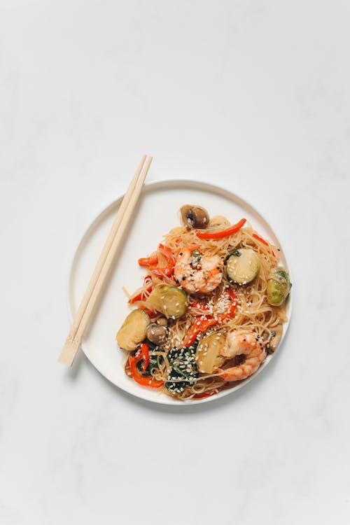 Noodle Dish With Shrimp on White Ceramic Plate