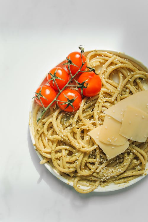 Free Plate with Pasta on the Table Stock Photo