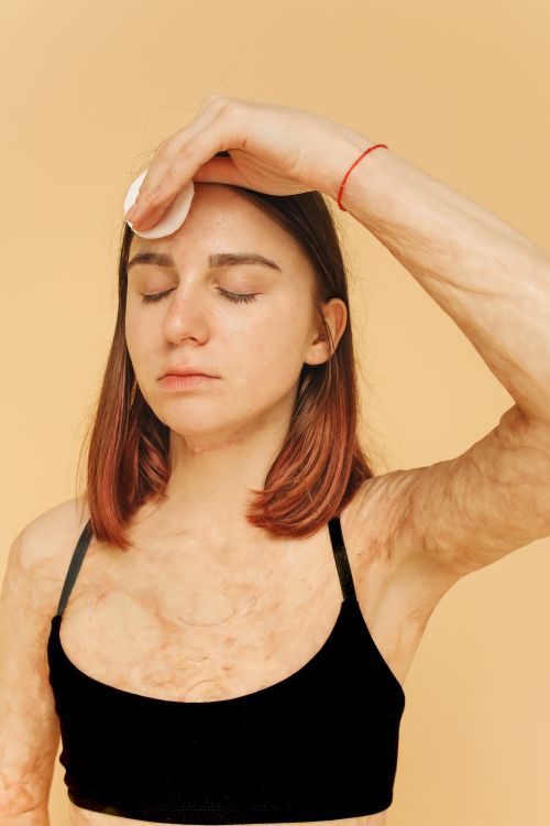 Free A powerful studio shot of a young woman embracing her skin with confidence and grace. Stock Photo