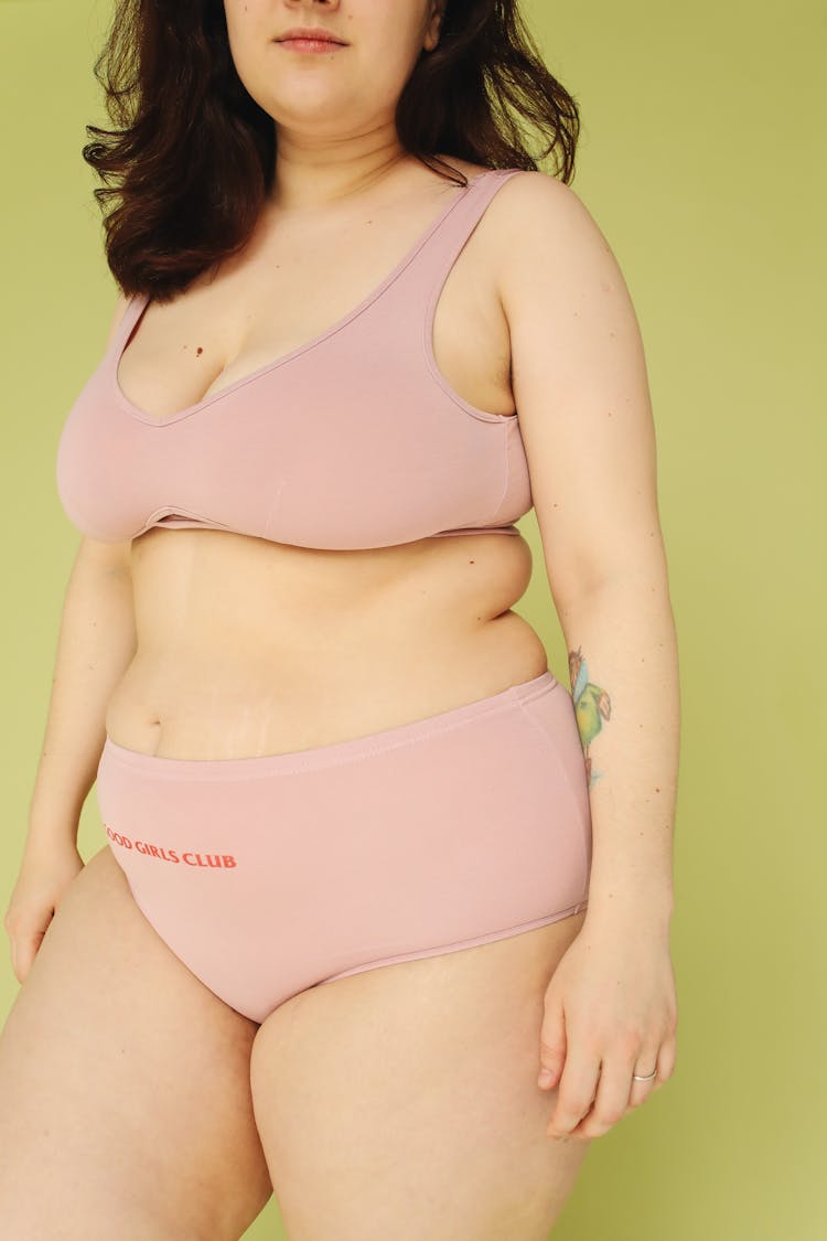 A Chubby Woman Wearing Pink Underwear