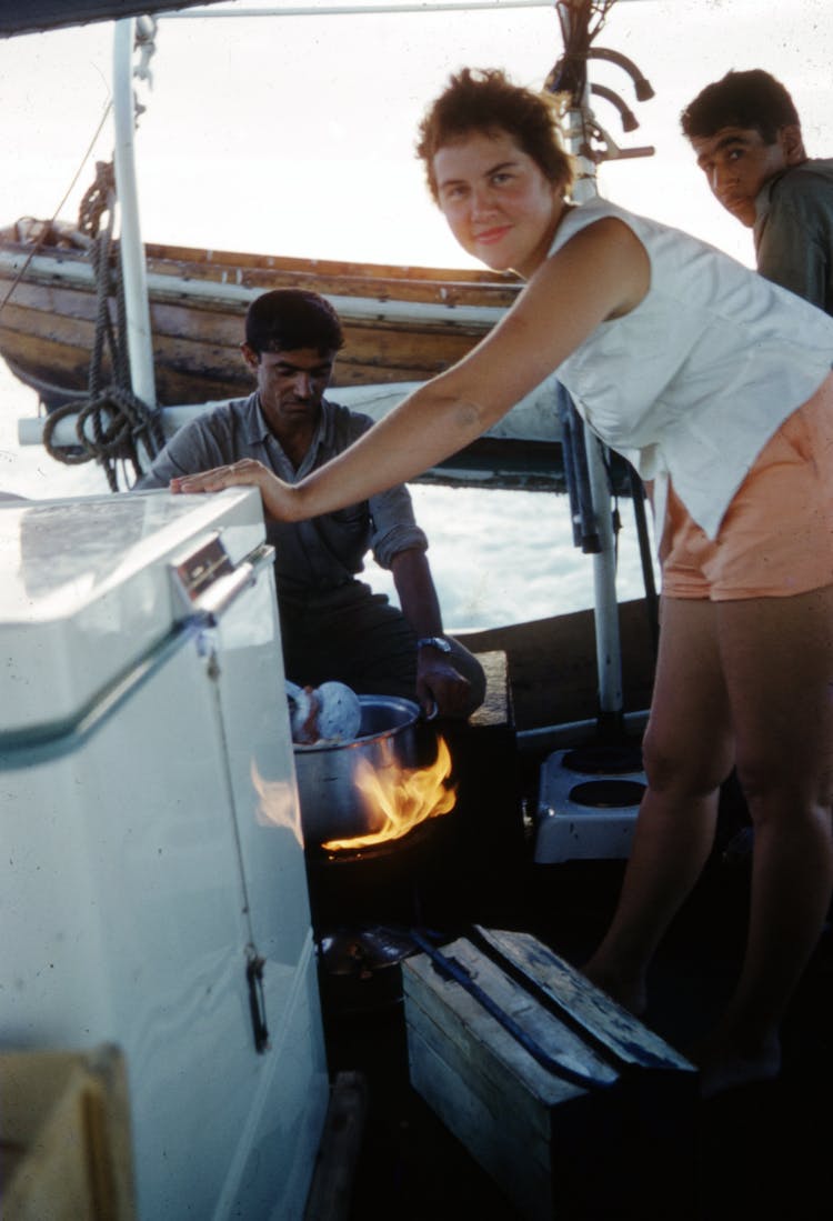 People Cooking On The Boat