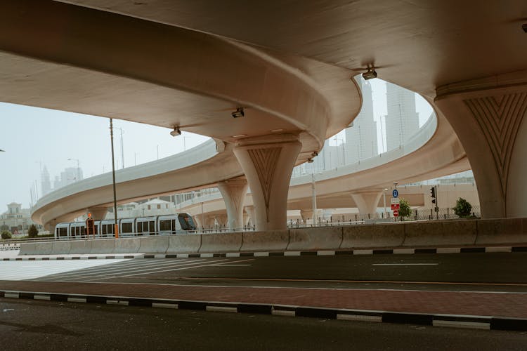 An Empty Road Under The Bridge