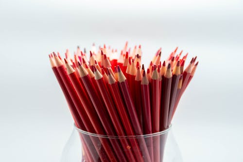 Free Red Coloring Pencils on Glass Holder Stock Photo