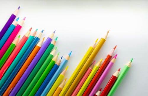 Free Colored Pencils on a White Surface Stock Photo