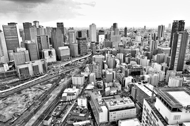 Grayscale Photo Of City Buildings