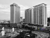 Grayscale Photo of City Buildings