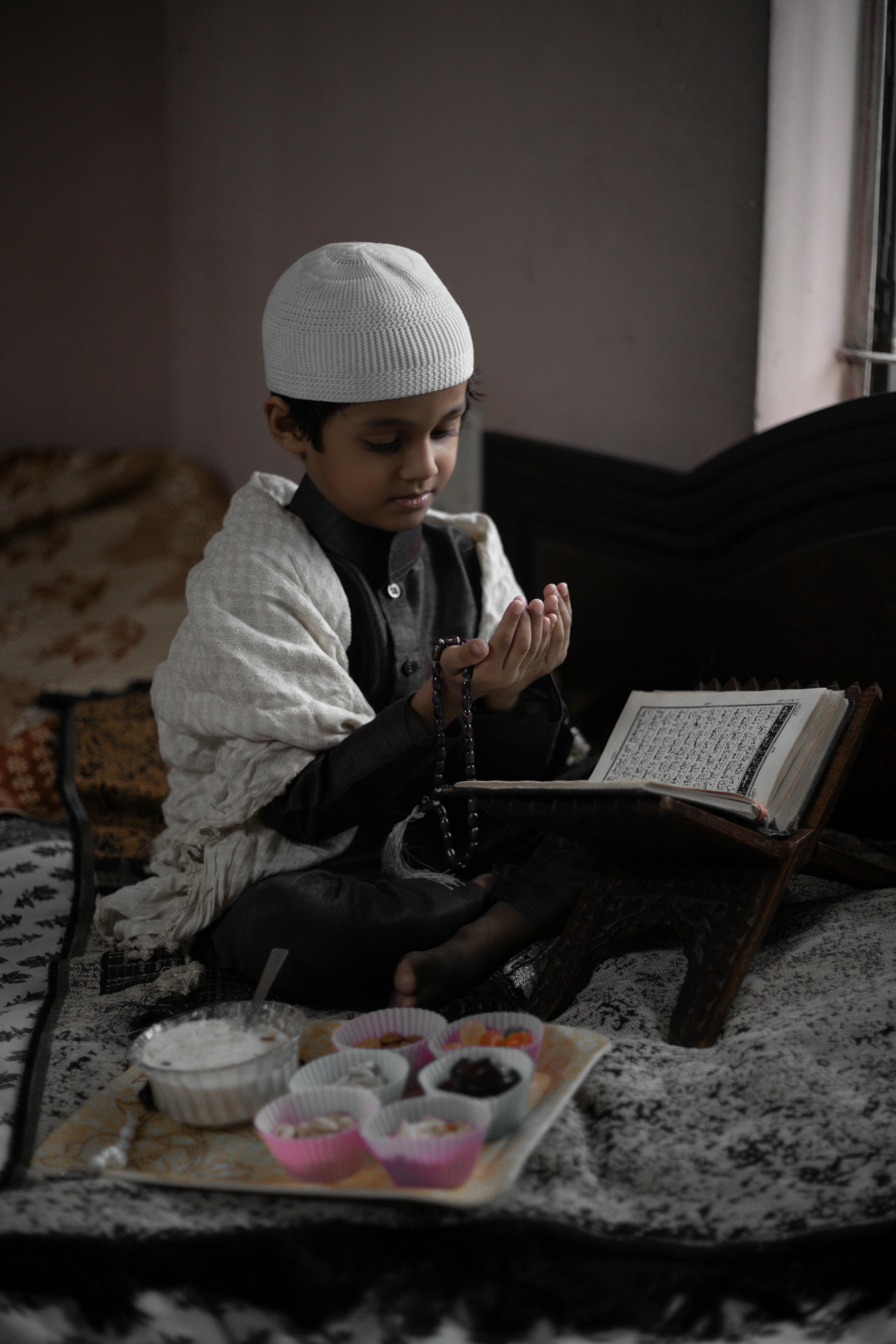 muslim baby boy with quran