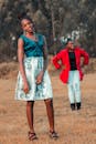 Well-dressed Women on a Field 