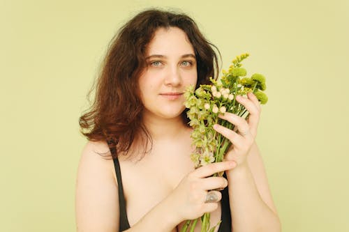 Woman in Holding Flowers