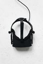 Black Leather Handbag on White Table