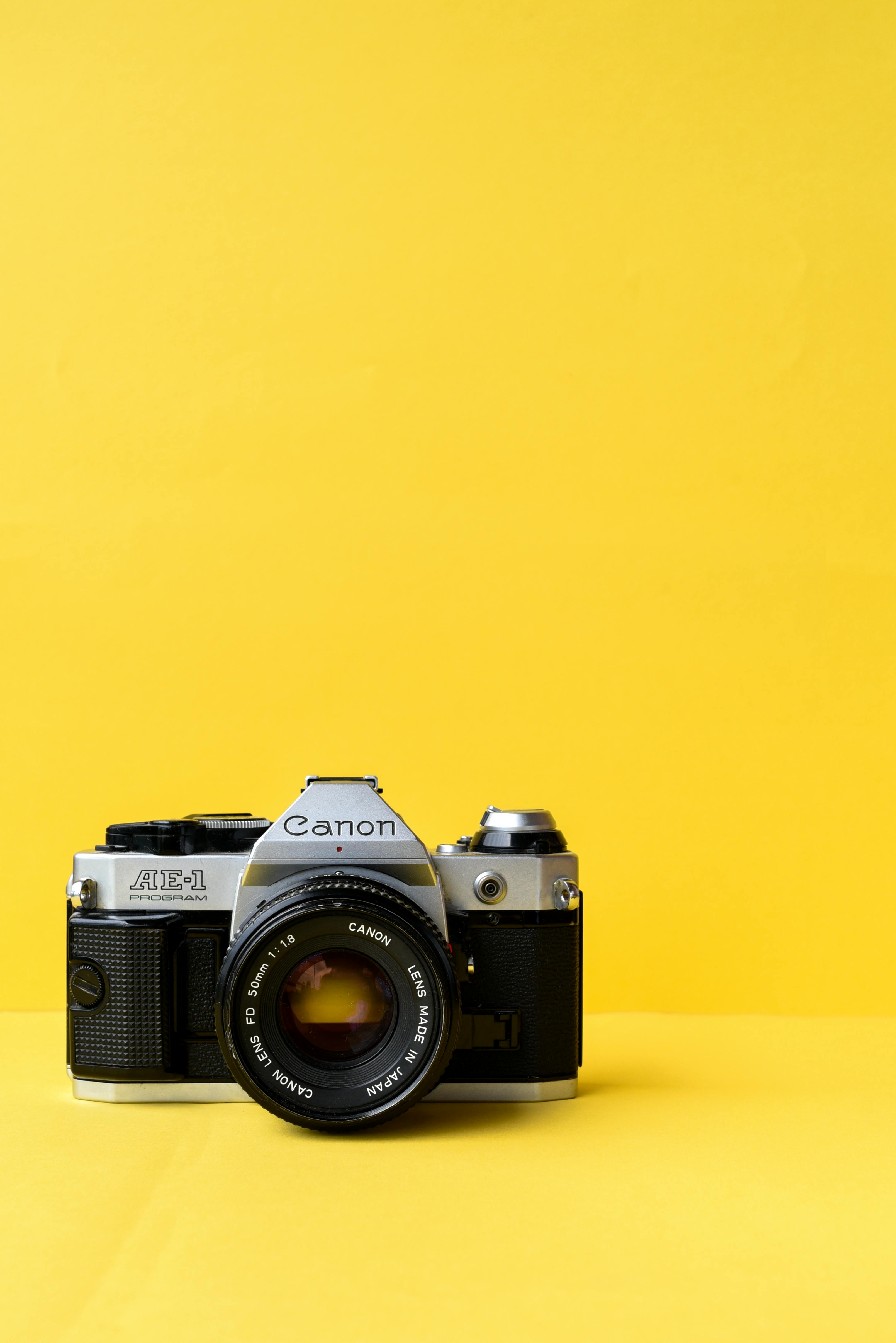 Film Camera on Yellow Background · Free Stock Photo
