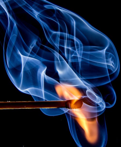Free Blue Smoke And Yellow Flame Painting Stock Photo