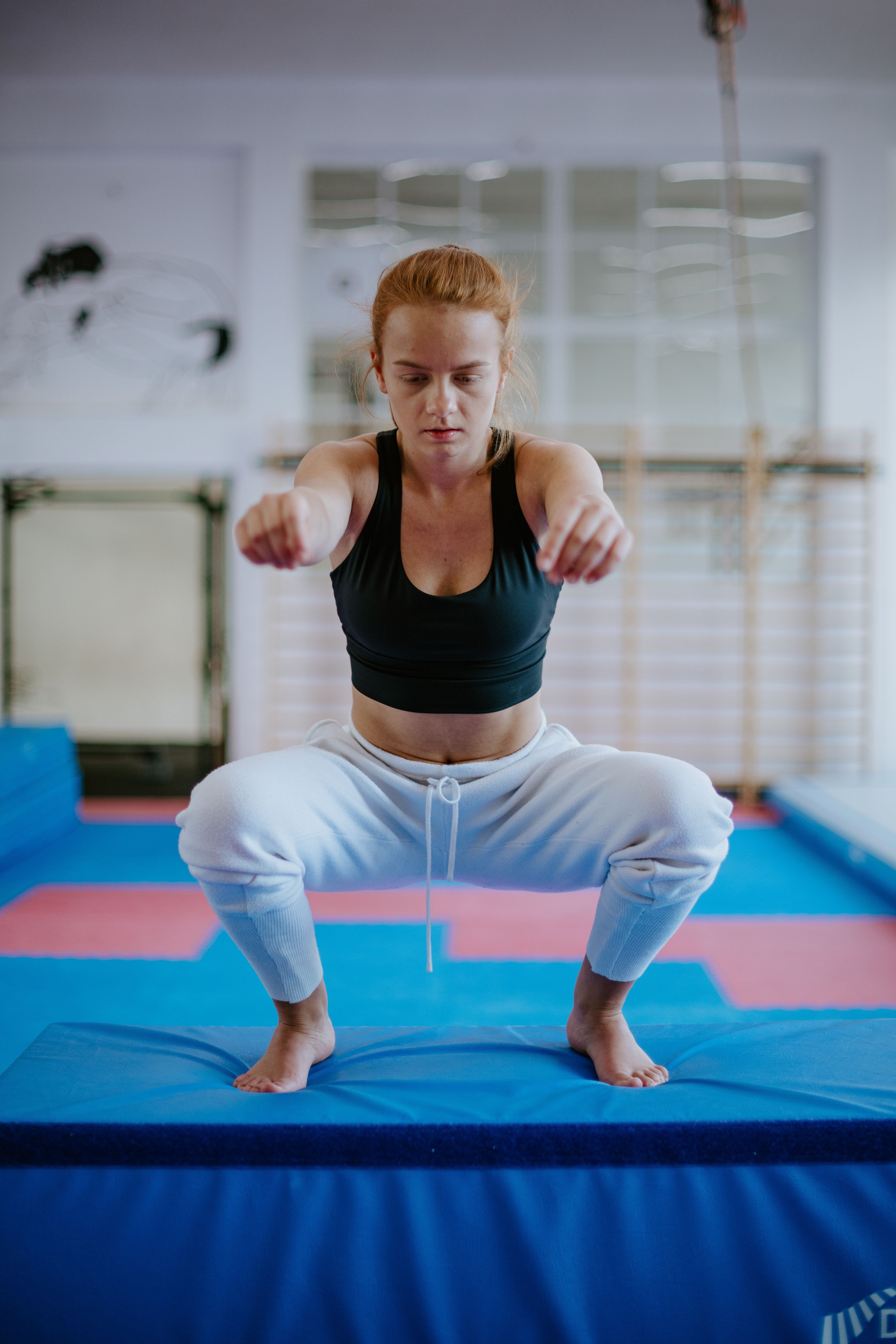 woman squating with no weight