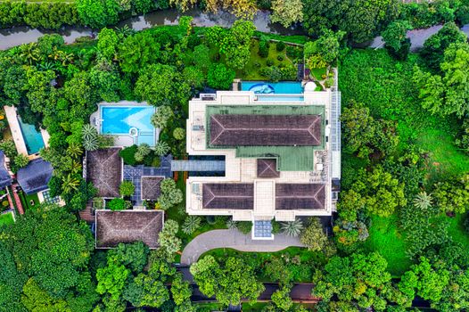 Stunning aerial view of a luxury estate surrounded by lush greenery in South Jakarta, Indonesia.