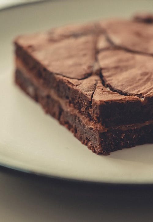 Chocolate Brownie on White Ceramic Plate 