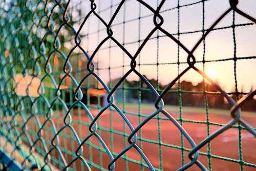 Free Close Up Photo of a Chain Link Fence Stock Photo