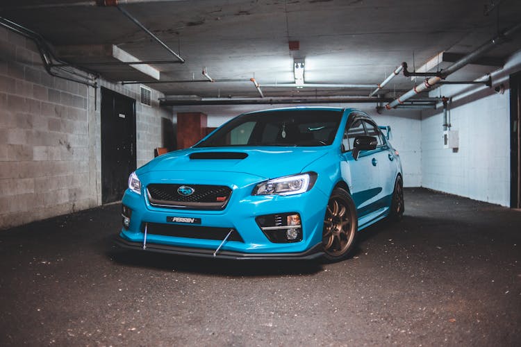 Modern Shiny Fast Car Parked In Garage