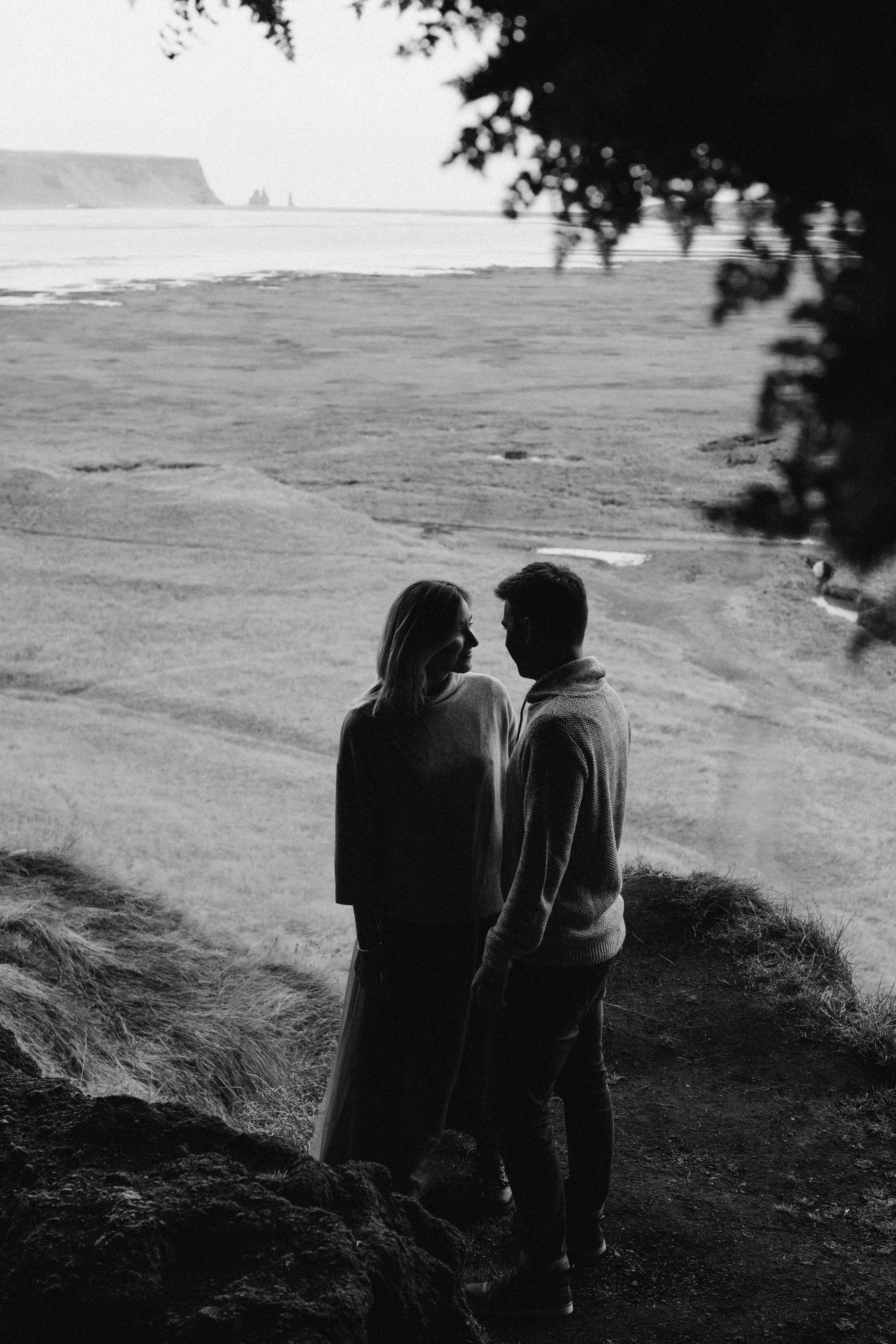 Gentle couple spending time together on ocean beach \u00b7 Free Stock Photo