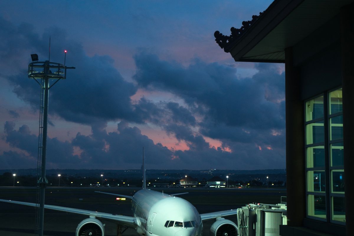 Airport apron and aircraft at dusk