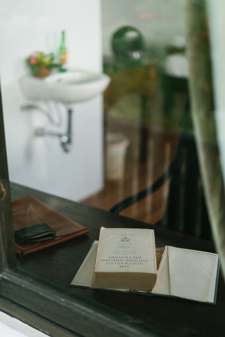 Stylish Bathroom Interior With Book On Windowsill