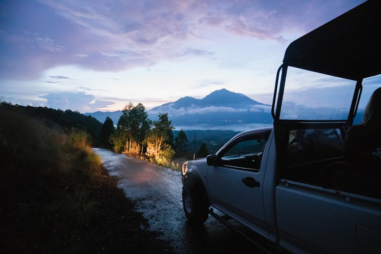 Car On Narrow Road At Night