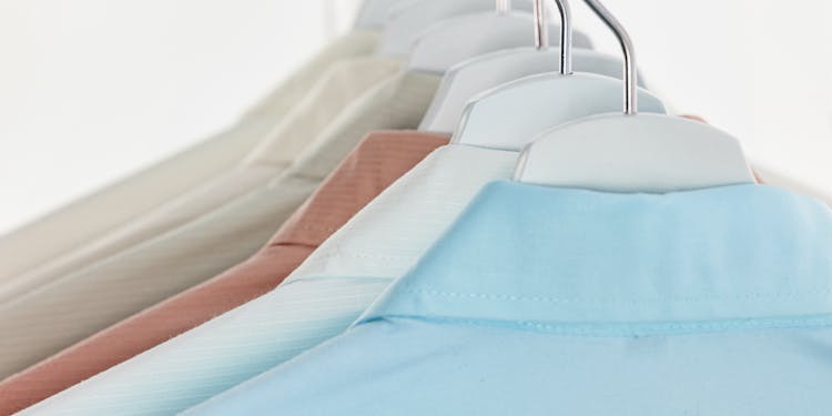 Collection Of Formal Clothes On Hangers