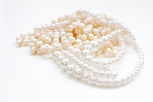 A Close-Up Shot of a Pearl Necklace