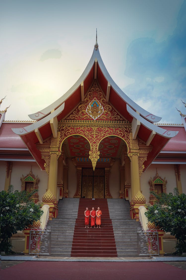 Buddhist Monks On Steps Of Temple