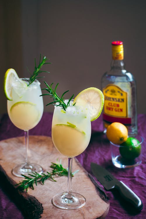 Free Cocktail Drinks in a Wine Glass with Lemon Stock Photo