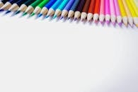 Colored Pencils on a White Surface