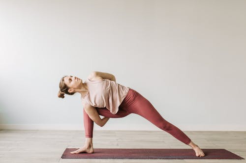 Free A Woman Doing Yoga Stock Photo