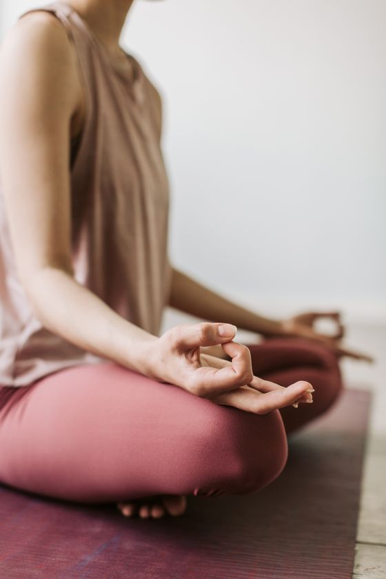 A woman pausing for a short breathing practice at home. Photo by Vlada Karpovich on Pexels.