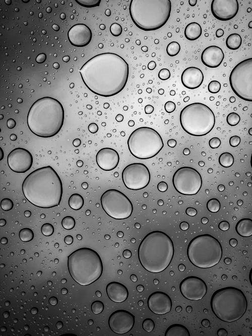 Abstract background of water drops on glass surface