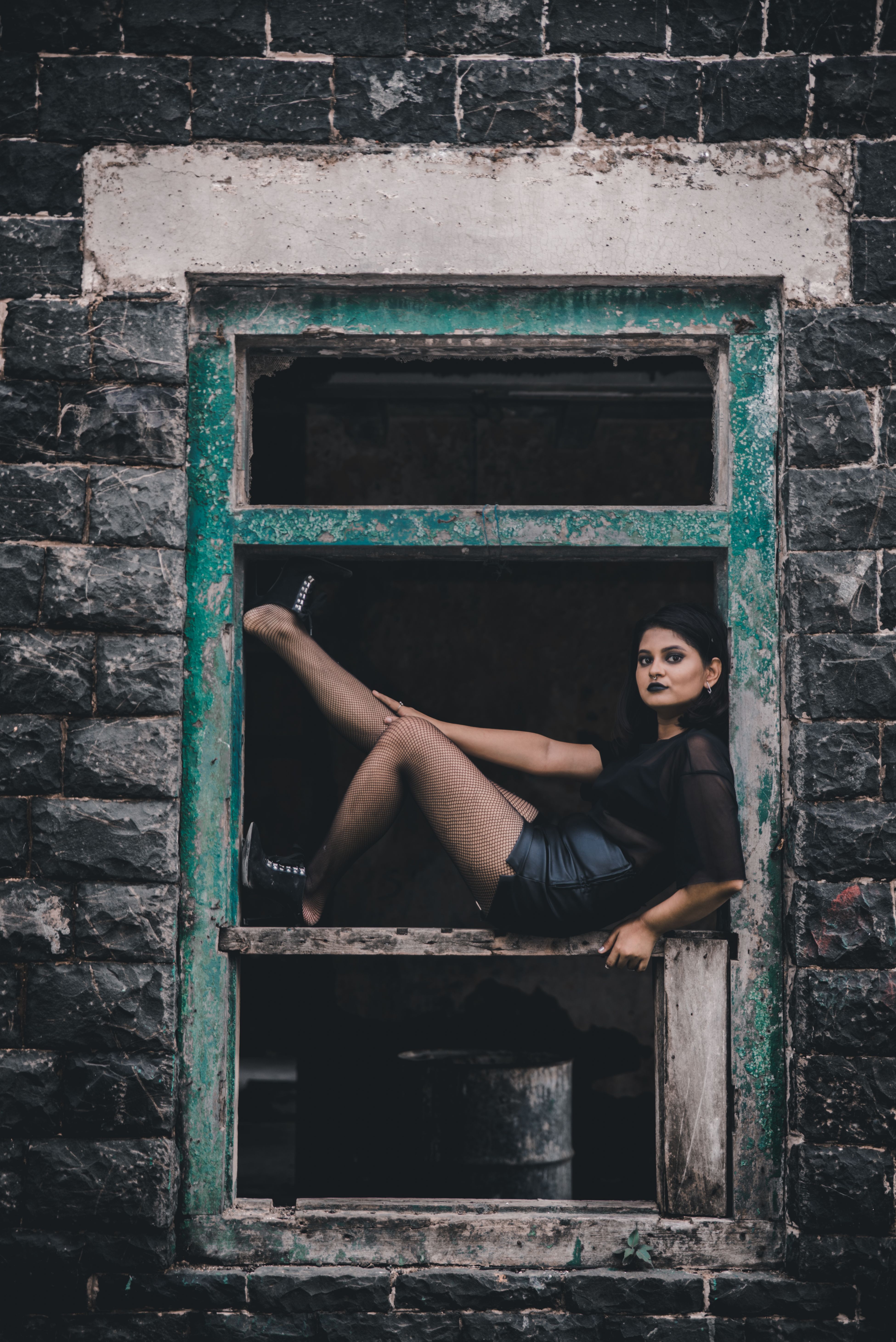 Woman in Black One Piece Swimsuit on Stairs · Free Stock Photo