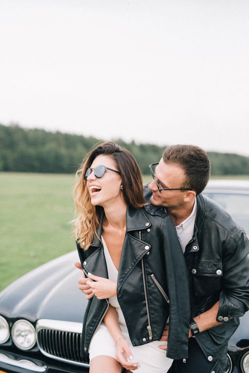 Free Happy Couple Wearing Leather Jackets Stock Photo