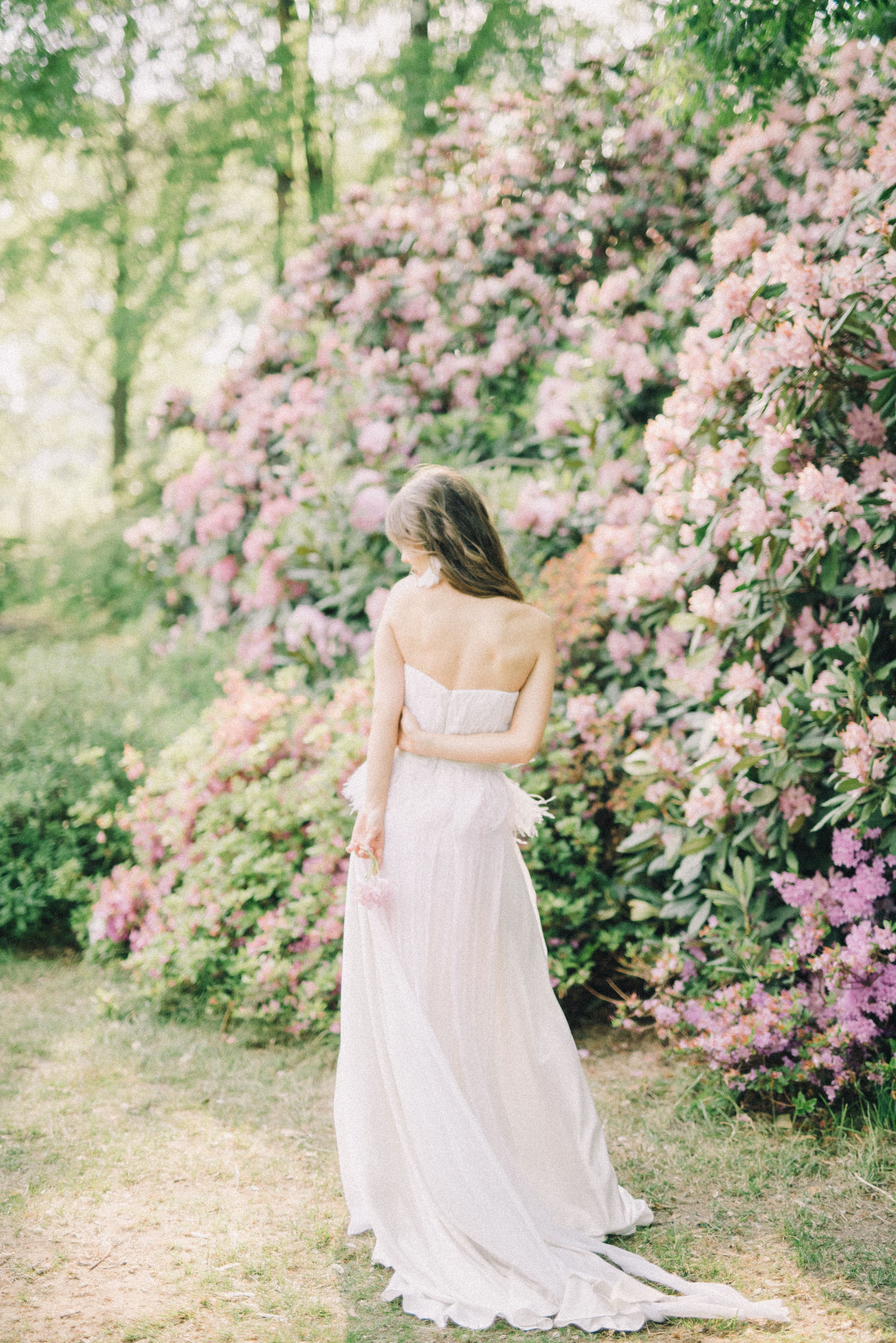 Woman in White Dress Running Through Meadow at Sunset · Free Stock Photo
