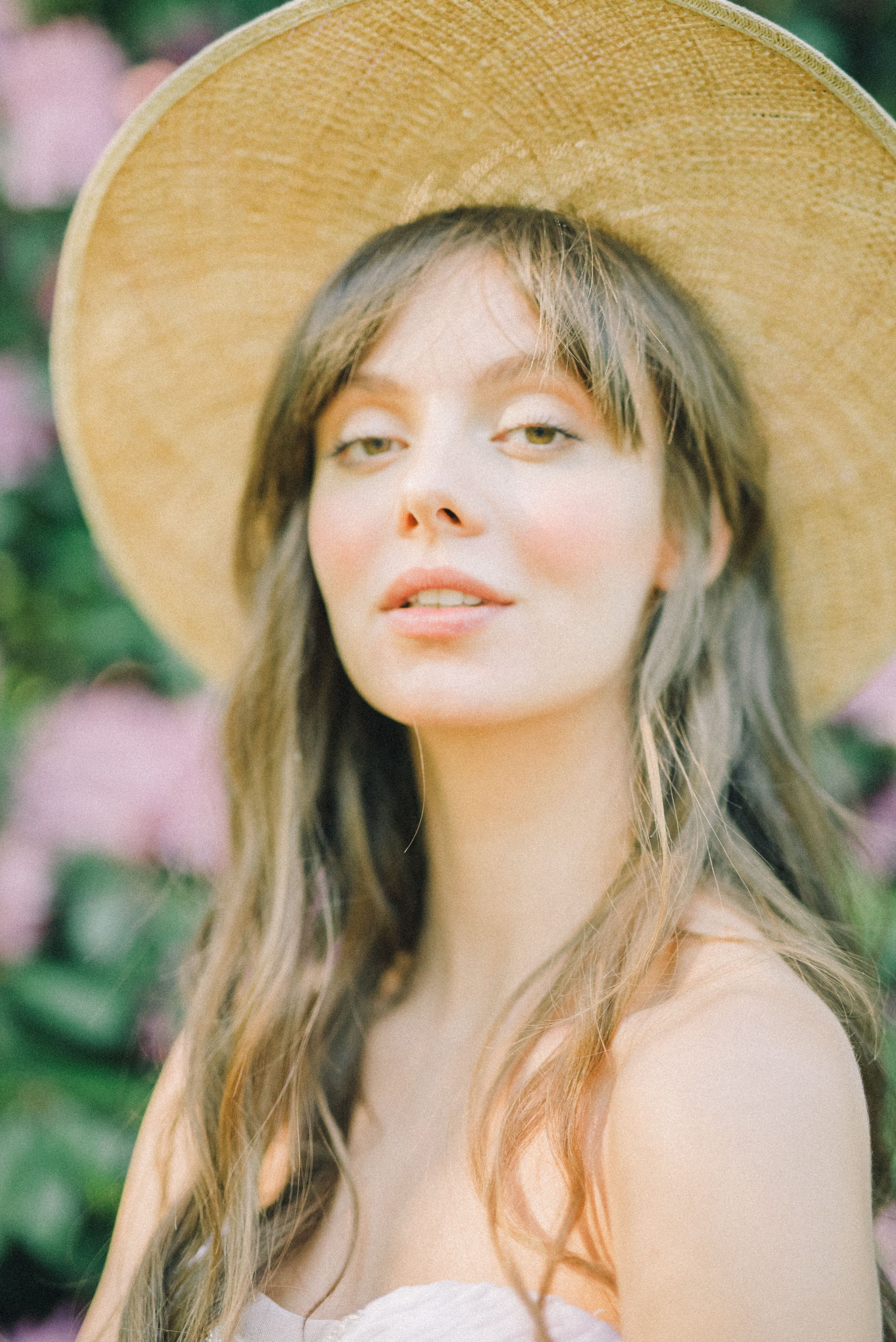Photo Of A Woman Wearing A Sun Hat Free Stock Photo photo-of-a-woman-wearing-a-sun-hat-free-stock-photo